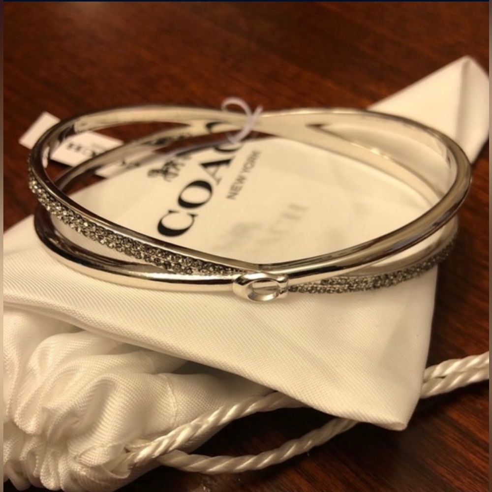 Coach Criss Cross Bangle
2-3/4″, will fit up to 8-1/2″ wrist.
F87946-SLV